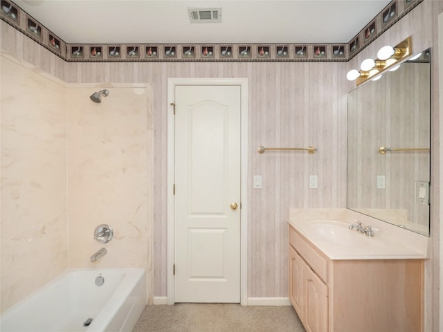 bathroom featuring vanity and  shower combination