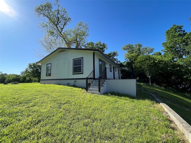 view of property exterior featuring a yard