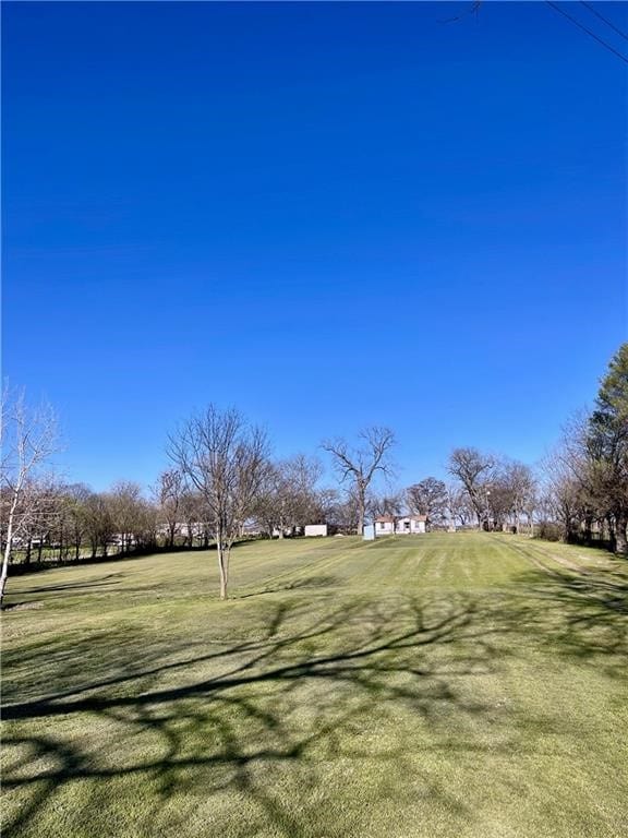 surrounding community featuring a lawn