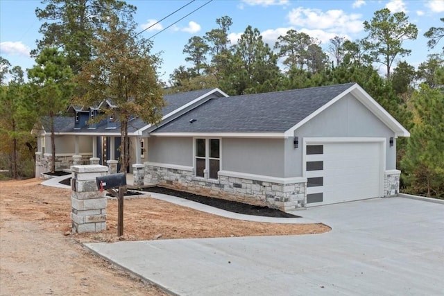 view of front of property featuring a garage