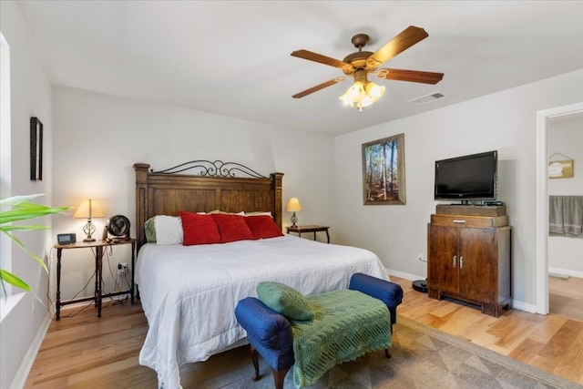 bedroom featuring ceiling fan and light hardwood / wood-style flooring