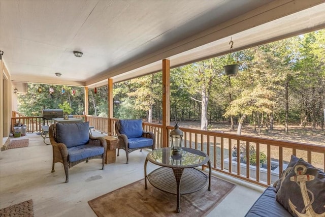133 Blue Jack Oak Ln, Bastrop, TX 78602 - deck with an outdoor hangout area and view of wooded area