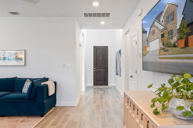 entrance foyer featuring light wood-type flooring