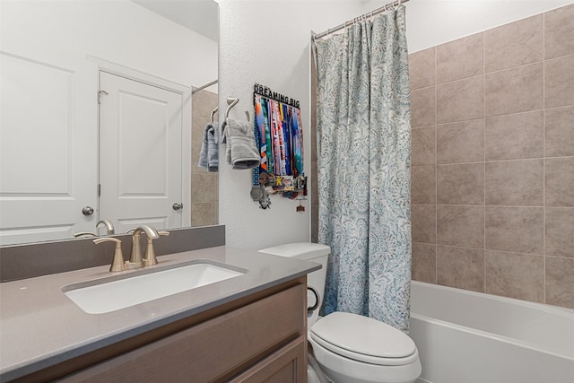 full bathroom with vanity, toilet, and shower / bath combo