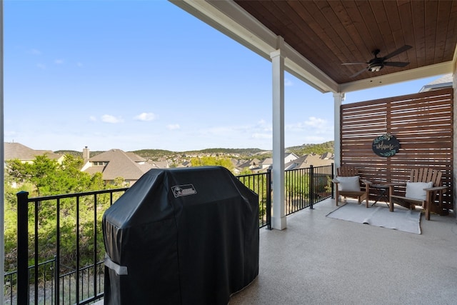 balcony with area for grilling and ceiling fan