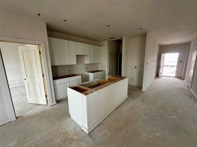 kitchen featuring white cabinetry and a center island