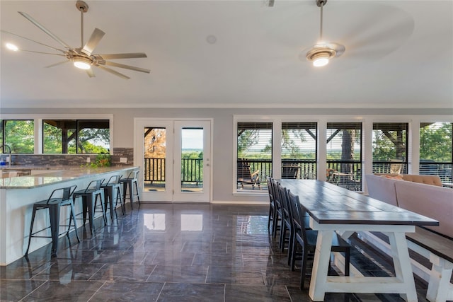 dining space with ceiling fan