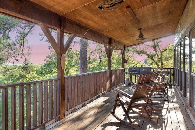 view of deck at dusk