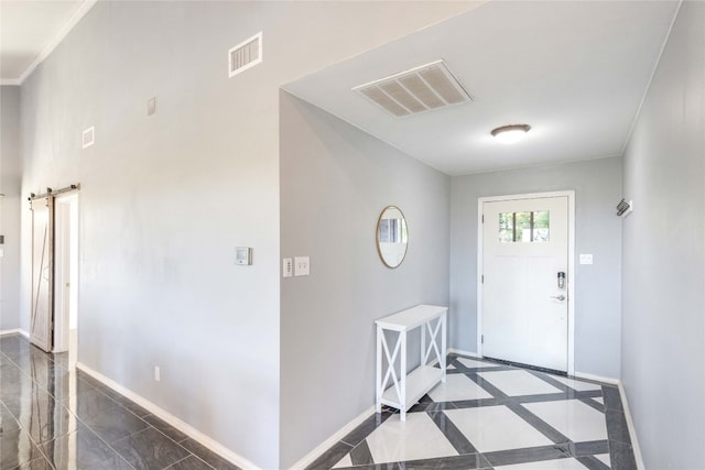 entrance foyer featuring a barn door