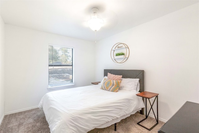 bedroom with light colored carpet