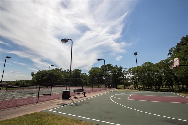 view of basketball court with tennis court