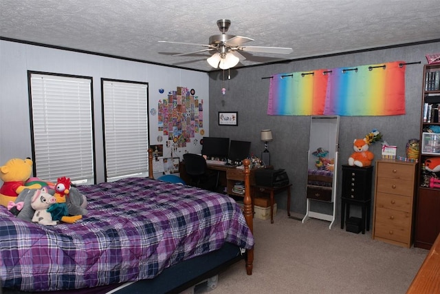 carpeted bedroom featuring a ceiling fan and a textured ceiling