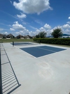 view of tennis court with basketball court