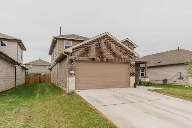 view of front property featuring a garage and a front lawn