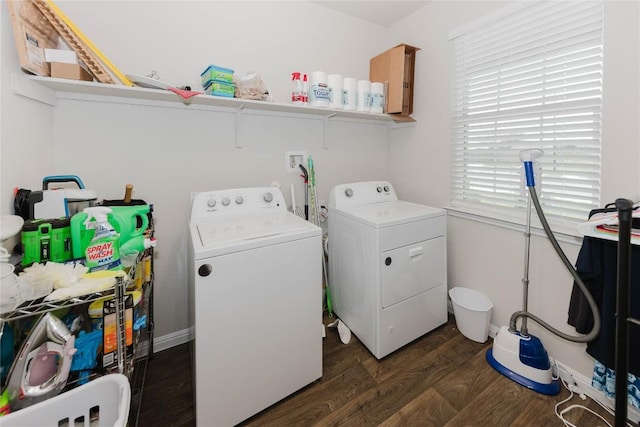 laundry room with dark wood-type flooring and washer and clothes dryer