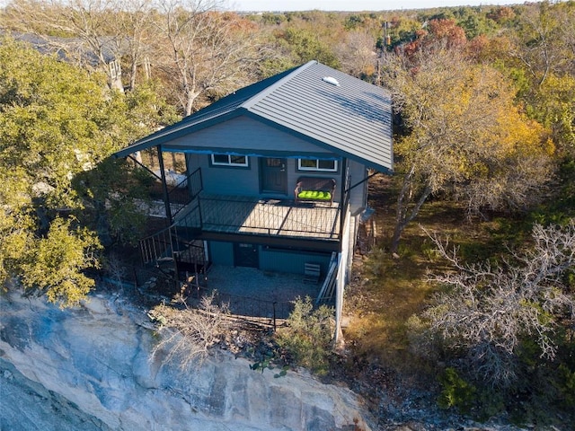 exterior space featuring a wooden deck