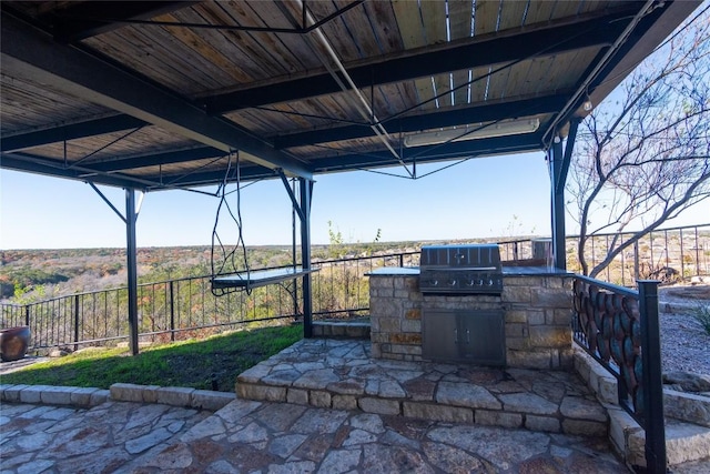 view of patio / terrace featuring an outdoor kitchen and grilling area