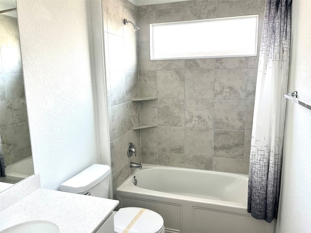 full bathroom featuring vanity, toilet, and shower / tub combo with curtain