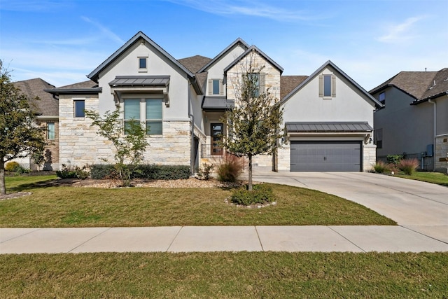 view of front facade with a garage and a front yard