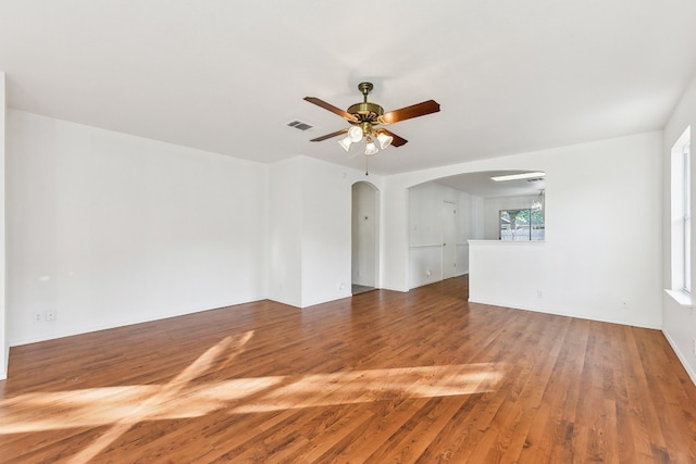 spare room featuring ceiling fan and wood-type flooring