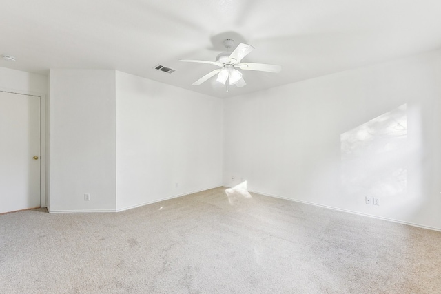 carpeted empty room with ceiling fan