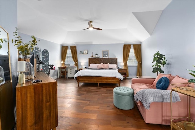 bedroom with ceiling fan, multiple windows, dark hardwood / wood-style floors, and vaulted ceiling