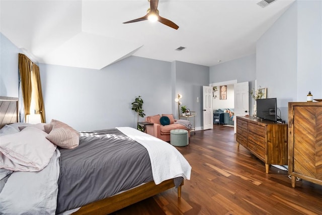 bedroom with ceiling fan and dark hardwood / wood-style flooring