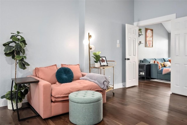 living area featuring dark hardwood / wood-style flooring