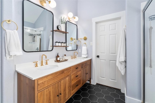 bathroom featuring vanity, tile patterned floors, and a shower with door