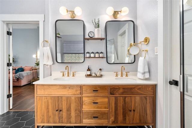 bathroom with vanity and tile patterned flooring