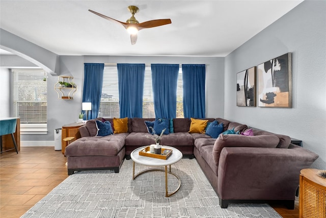 living room with ceiling fan