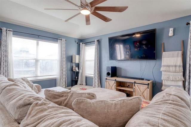 living room featuring ceiling fan