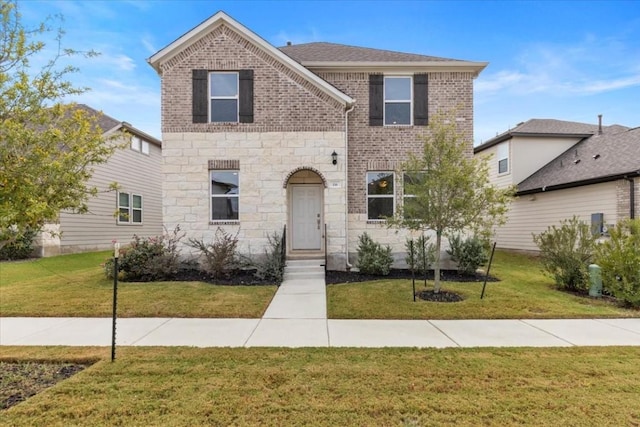 front of property featuring a front lawn