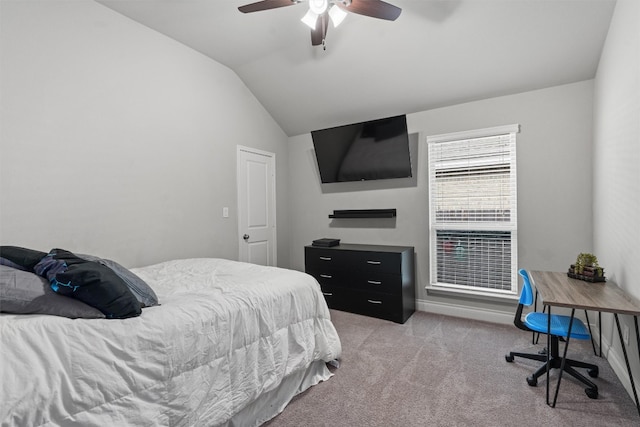 carpeted bedroom featuring ceiling fan and lofted ceiling