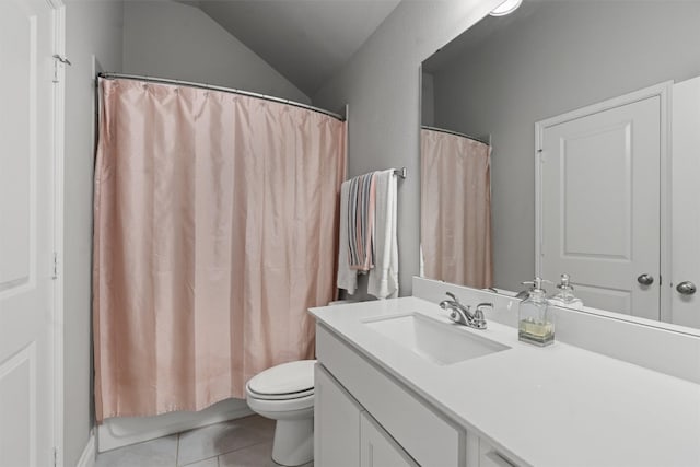 full bathroom with tile patterned flooring, lofted ceiling, toilet, vanity, and shower / tub combo