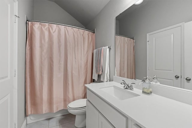 221 Magdalene Way, Liberty Hill, TX 78642 - full bathroom with lofted ceiling, shower / bathtub combination with curtain, vanity, tile patterned floors, and toilet