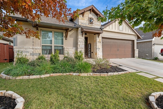 view of front of home featuring a garage and a front yard