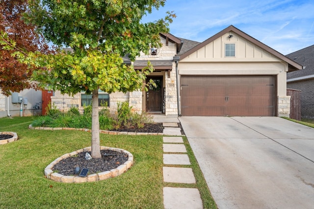 view of front facade featuring a front yard and a garage