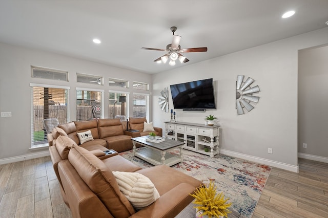 living room with ceiling fan