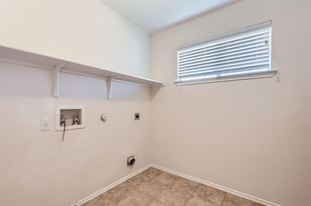 clothes washing area with electric dryer hookup, gas dryer hookup, and washer hookup