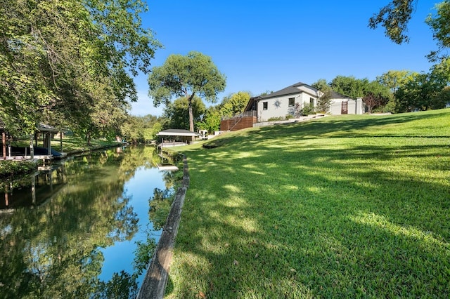 view of yard with a water view