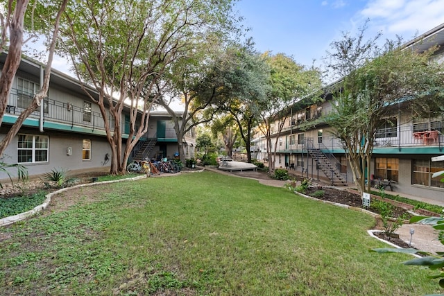 view of community featuring a lawn