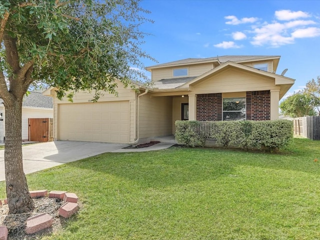 view of front of property with a garage and a front yard