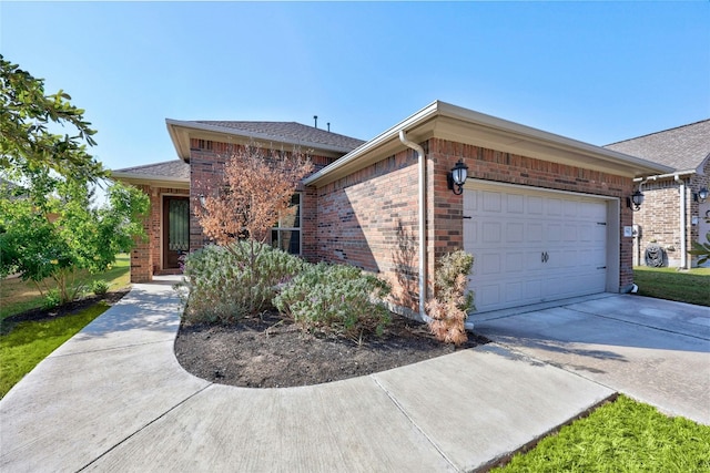 ranch-style home with a garage