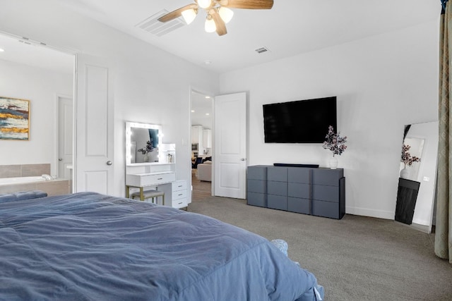 carpeted bedroom featuring ceiling fan and visible vents
