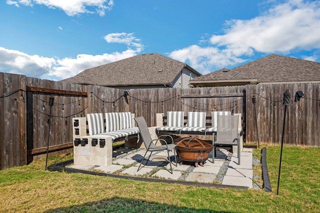 view of patio / terrace with a fire pit