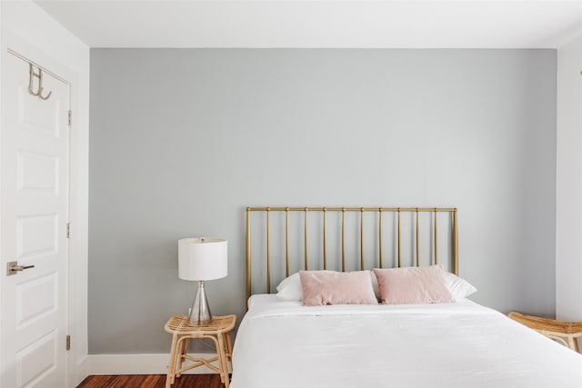 bedroom featuring wood-type flooring