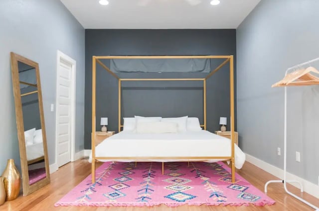 bedroom featuring hardwood / wood-style flooring