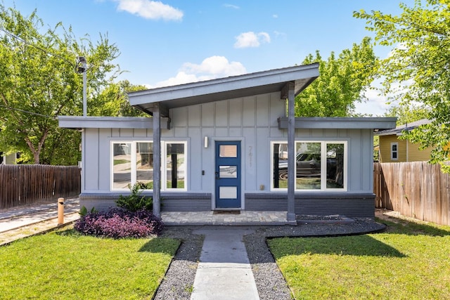 7611 Providence Ave Unit A, Austin, TX 78752 - view of front of property featuring board and batten siding
