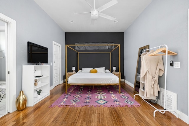 7611 Providence Ave Unit A, Austin, TX 78752 - bedroom featuring wood finished floors and ceiling fan